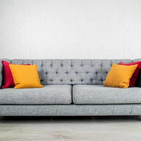 elegant-and-trendy-view-of-country-styled-sofa-with-colorful-pillows-free-photo